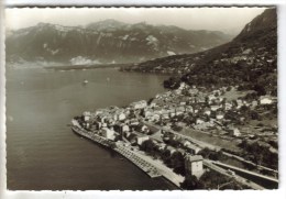 CPSM (+ 1) SAINT GINGOLPH (Suisse-Valais) - Vue Générale Ville Franco Suisse +Horloge Fleurie Genève - Saint-Gingolph