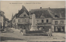 23 -  AUZANCES  -  Le Monument Et Rue De L´Eglise - Auzances