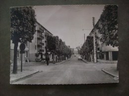 Carte Postale Ancienne De Brétigny-sur-Orge: Boulevard De La République - Bretigny Sur Orge