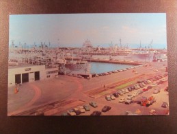 WATER FRONT AT U.S NAVAL BASE NORFOLK VIRGINIA SHOWING NAVAL VESSELS MOORED TO AND NEAR PIER 4 - Norfolk