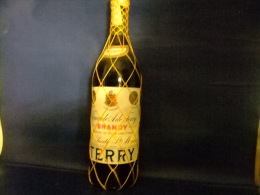 ANTIGUA BOTELLA BRANDY TERRY CENTENARIO LITRO VINTAGE 1970 / 1975 - Alcoolici