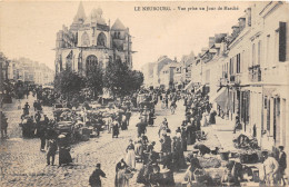 27- LE NEUBOURG - VUE PRISE UN JOUR DE MARCHE - Le Neubourg