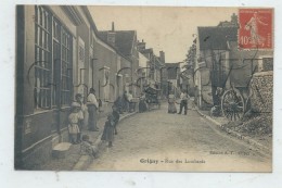 Grigny (91) : L Marchand Ambulant Rue Des Lombards Pris Au Niveau Du Magasin D'épicerie  Env 1914 (animé)  PF. - Grigny