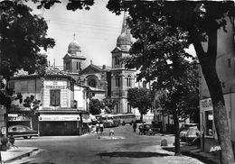 31-REVEL- LE ROND-POINT ET L'EGLISE NOTRE DAME - Revel