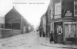 59 - Steenwoorde - Rue De Poperinghe (Estaminet A La Tête D'Or, Animée, Edition Vanhée, Imp. Edia) - Steenvoorde