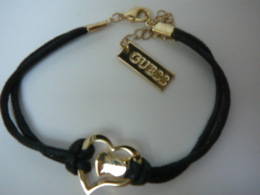 GUESS " BRACELET   SIGLE" DANS POCHETTE SIGLEE   LIRE ET VOIR!! - Non Classés