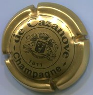 CJ-CAPSULE-CHAMPAGNE DE CAZANOVE N°05 Petit écusson - De Cazanove