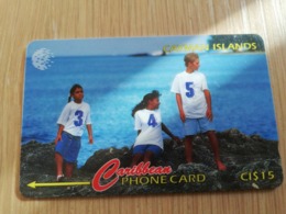 CAYMAN ISLANDS  CI $ 15,-  CAY-131F CONTROL NR 131CCIF   3 CHILDREN ON ROCKS     Fine Used Card  ** 3111** - Kaimaninseln (Cayman I.)