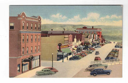 Rock Springs, Wyoming, USA. "North Front Street, Rock Springs, Wyoming", Stores, Old Cars. 1930-40's Linen Postcard - Rock Springs