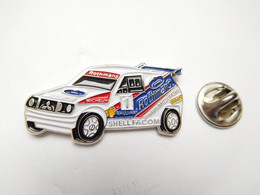 Beau Pin's Pins , Auto Mitsubishi , Rallye , Facom , Tabac Rothmans , Michelin , Shell - Mitsubishi