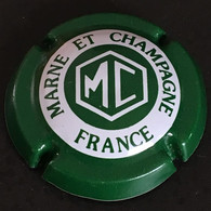 282 - 5a - Marne Et Champagne Initiales MC (vert Et Blanc) Lettres épaisses Capsule De Champagne - Marne Et Champagne