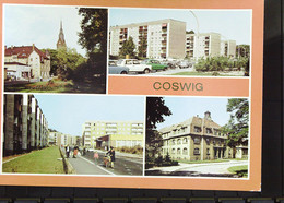 DDR: AK Von Coswig (Sa.) Mit 4 Ansichten: F.Engels-Platz, Straße Der Befreiung, Pflegeheim, WBS-70-Wohnblocks Postfrisch - Coswig