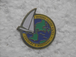 Pin's Sport VOILE - VENDEE GLOBE 92/93 Avec La Marque CACOLAC D'AQUITAINE - Pins Voilier Vendée-Globe - Voile