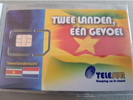 SURINAME  TELESUR   SIMCARD /TWEELANDENSIM SURINAME/NETHERLANDS  MINT IN WRAPPER (R) DIFFERENT  NEW CHIP !!  ** 13342** - Suriname