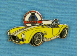 1 PIN'S //  ** L'" AC COBRA " VOITURE DE SPORT / 1960-1970 / MOTEUR V8 BOITE MANU 4 RAPPORTS FORD USA ** . (23/25) - Ford