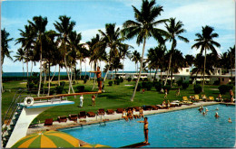Florida Miami Key Biscayne The Key Biscayne Hotel Pool And Cottages With Golf Course In Background - Miami