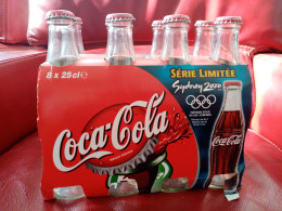 COCA-COLA COKE - Pack De 8 Bouteilles Vides Avec Capsules - Série Limitée SYDNEY 2000 - FRANCE JEUX OLYMPIQUES - Limonade