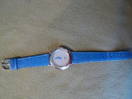 MONTRE PUBLICITAIRE PEUGEOT 106 KID. GENUINE LEATHER. ANNEES 90 / 2000 - Reclamehorloges