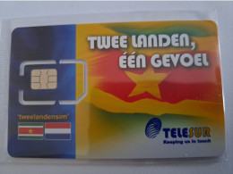 SURINAME  TELESUR   SIMCARD /TWEELANDENSIM SURINAME/NETHERLANDS  MINT IN WRAPPER (R) DIFFERENT  NEW CHIP !!  ** 15535** - Suriname