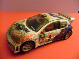 SCALEXTRIC // PEUGEOT 206 WRC EFECTO BARRO // PILOTOS MUNIENTE-PUJOL // - Circuits Automobiles