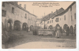 CPA :  14 X 9  -   ALBY-sur-CHERAN.  - Chef-lieu  - La Place - Les Portiques  - Le  Trophée 1714 - Alby-sur-Cheran