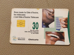 Ivory Coast-CI-CIT-0030B)-people On Telephones-(25)-(30units)-(0001674662)-(tirage-?)-used Card+1card Prepiad Free - Côte D'Ivoire