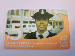 BERMUDA  $ 5,-  LOGIC/  POLICE LADY   IN BERMUDA / DATE 4 /2005 / 9700 EX   PREPAID CARD  Fine USED  **16193** - Bermuda