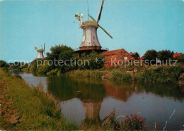 72939494 Greetsiel Doppelmuehlen Greetsiel - Krummhoern