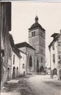 CPSM 39 L'EGLISE VUE DE LA RUE DES PRETRES 1952 - Orgelet