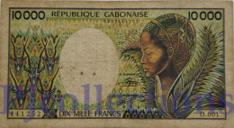 GABON 10000 FRANCS 1984 PICK 7a AVF W/PINHOLES - Gabon
