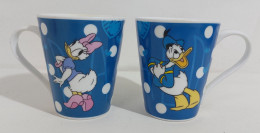 69800 Coppia Tazze Da Latte In Ceramica Disney - Paperino E Paperina - Kopjes