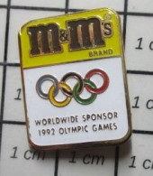 1618c Pin's Pins / Beau Et Rare / JEUX OLYMPIQUES / CONFISERIE M&M's WORLDWIDE SPONSOR 1992 - Informatique