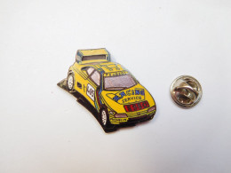 Superbe Pin's En EGF , Auto Peugeot , Rallye Paris Dakar , Racing Service , ESSO , Michelin ,  Signé Démons & Merveilles - Peugeot