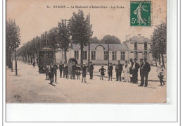 STAINS - Le Boulevard D'Aubervilliers - Les Ecoles - TRAMWAY - Très Bon état - Stains