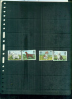 GRANDE BRETAGNE  CHIENS 4 VAL NEUFS A PARTIR DE 0,60 EUROS - Unused Stamps