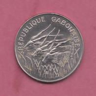 Gabon, 1985 - 100 Francs- Nickel- Obverse Three Great Eland. Reverse Denomination Within Gazelle-  BB++,VF++, TTB++, SS+ - Gabun