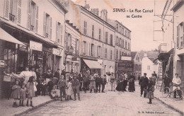 Stains - La Rue Carnot - Au Centre -  CPA °J - Stains