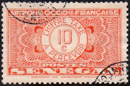 Sénégal Obl. N° Taxe 23 - Pièce De Monnaie Sur Fond Burelé Le 10c Orange - Timbres-taxe