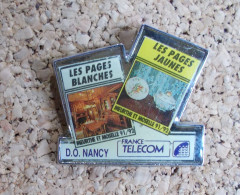 Pin's - France Télécom - D.O. Nancy Les Pages Blanches, Les Pages Jaunes - Meurthe Et Moselle 1991/92 - France Télécom