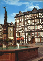 72447330 Butzbach Marktbrunnen Fachwerk Mit Benderschem Haus Butzbach - Butzbach