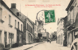 CPA Le Mesle Sur Sarthe-Les Halles Et La Rue De L'église-4-Timbre         L2947 - Le Mêle-sur-Sarthe