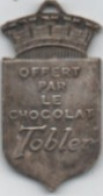Porte Cleff  Tobler   En Métal  45 M X  24  Mm - Schokolade