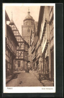 AK Alsfeld, Strasse Obere Fuldergasse Mit Geschäft Und Kirche  - Alsfeld