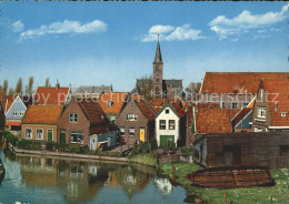 72220677 Volendam Ortspartie Mit Kirche Volendam - Andere & Zonder Classificatie