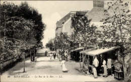CPA Ouistreham Riva Bella Calvados, Rue De La Mer - Autres & Non Classés