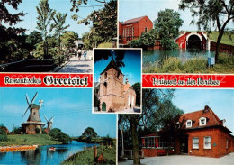 73836131 Greetsiel Motive Ferienort An Der Nordsee Kirche Windmuehle Greetsiel - Krummhoern