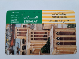 UNITED ARAB EMIRATES -ETISALAT- UAE E33   DHS 30 TAMURA/ Magnetic Phonecard As Scan  FINE USED    ** 16936** - Emirats Arabes Unis