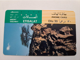 UNITED ARAB EMIRATES -ETISALAT- UAE E67   DHS 30    TAMURA/ Magnetic Phonecard As Scan  FINE USED    ** 16939** - Emirats Arabes Unis