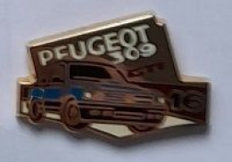 Pin's  Automobiles  PEUGEOT  309  G T I 16  Bleu  Signé  HELIUM - Peugeot