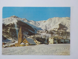 SAINT ETIENNE DE TINEE   Auron   Vue De La Place La Chapelle Sainte Erige Et Au Fond Le Massif De Las Donnas - Saint-Etienne-de-Tinée